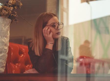 Woman Wearing Black Jacket and Black Framed Eyeglasses