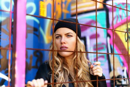 Woman Wearing Black Knit Cap With Black Jacket