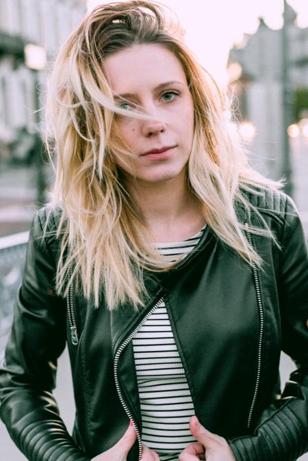 Woman Wearing Black Leather Zip-up Jacket