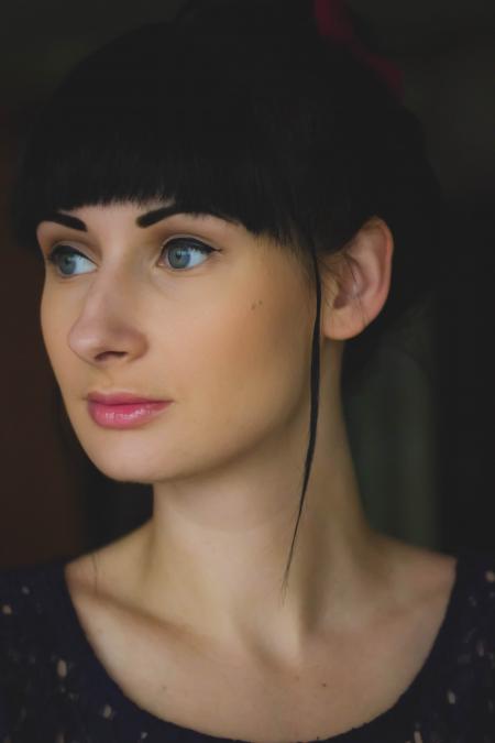 Woman Wearing Black Scoop Neck Shirt