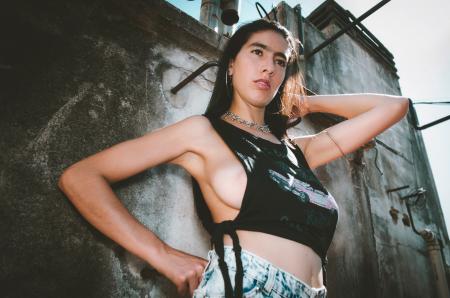 Woman Wearing Black Sleeveless Crop-top