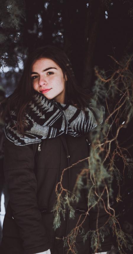 Woman Wearing Black Zip-up Jacket Posing Under Tree