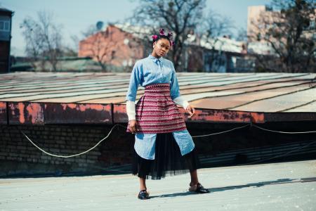 Woman Wearing Blue and Red Long-sleeved Dress on Road