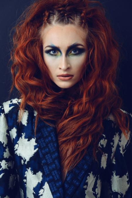 Woman Wearing Blue and White Blazer