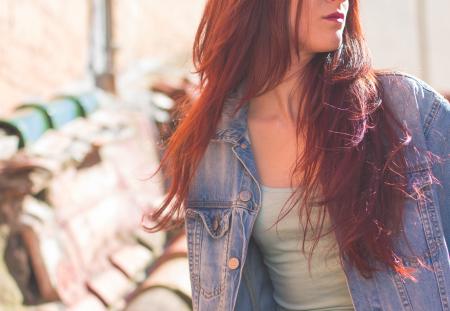 Woman Wearing Blue Denim Jacket and Grey Shirt