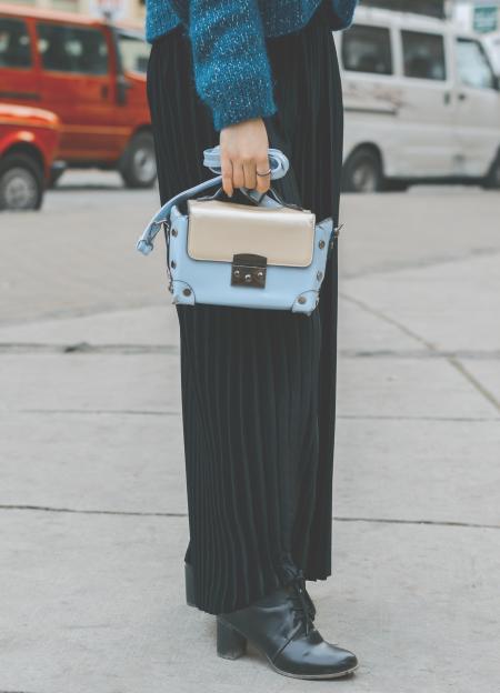 Woman Wearing Blue Leather Purse