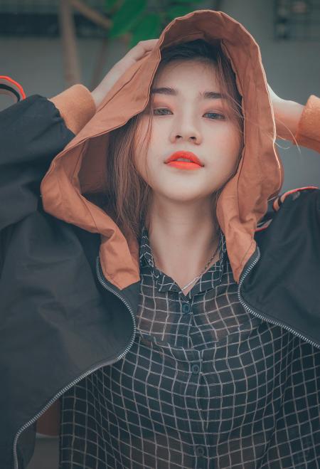 Woman Wearing Brown and Black Hoodie Jacket