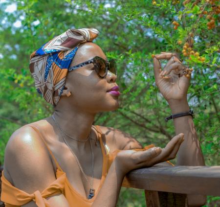 Woman Wearing Brown, Blue, and Beige Head Dress