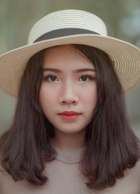 Woman Wearing Brown Bucket Cap