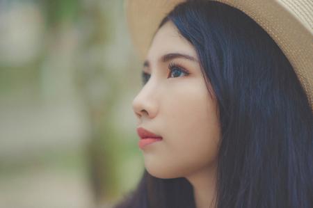 Woman Wearing Brown Fedora Hat