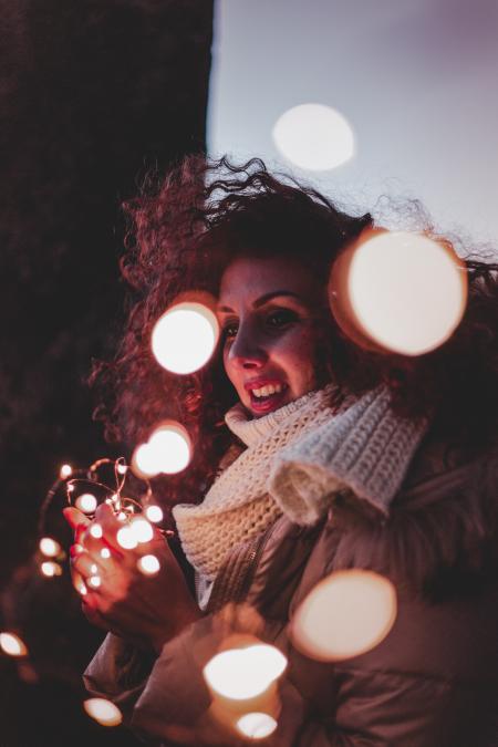 Woman Wearing Brown Leather Jacket and Knitted Scarf