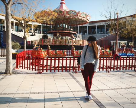 Woman Wearing Gray Sweater and Maroon Pants