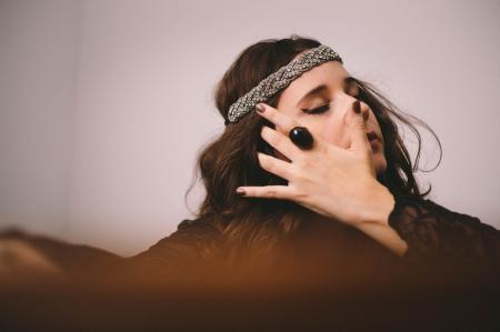 Woman Wearing Gray Woven Headband