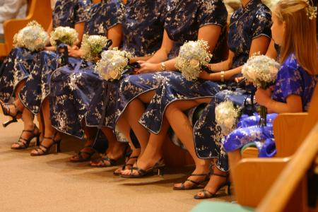 Woman Wearing Green and Gold Floral Traditional Dress
