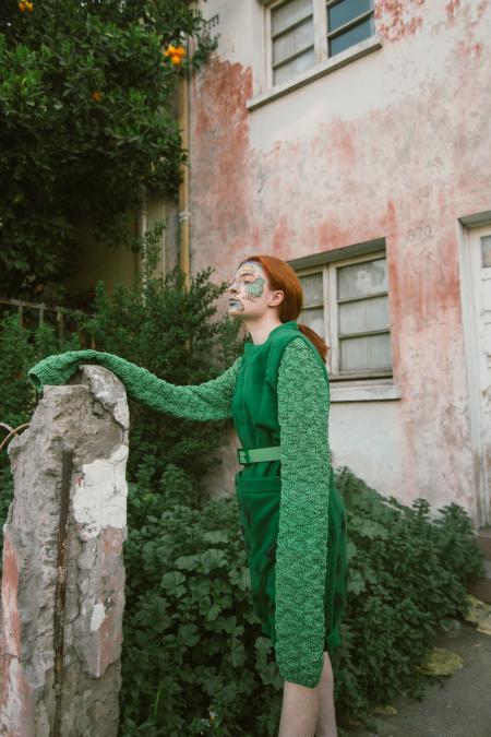 Woman Wearing Green Long-sleeved Costume With Face Paint