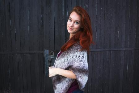 Woman Wearing Grey Printed Poncho Posing for Photo