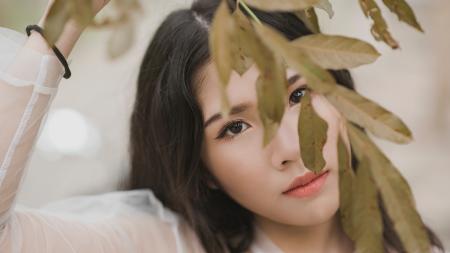 Woman Wearing Illusion Long-sleeved Shirt Under Green Leaf