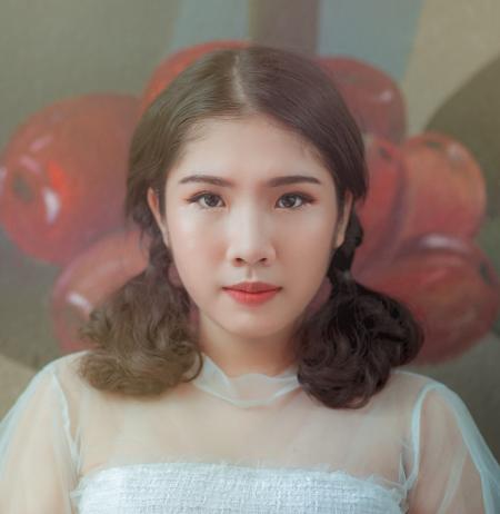 Woman Wearing Illusion-neck Dress Facing Camera