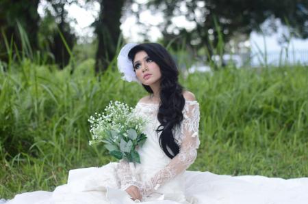 Woman Wearing of White Off-shoulder Bridal Dress