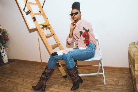 Woman Wearing Pink and Red Floral Jacket