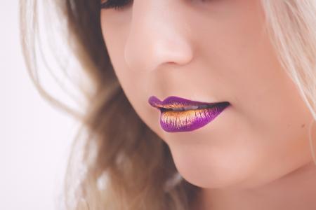 Woman Wearing Pink and Yellow Lipstick