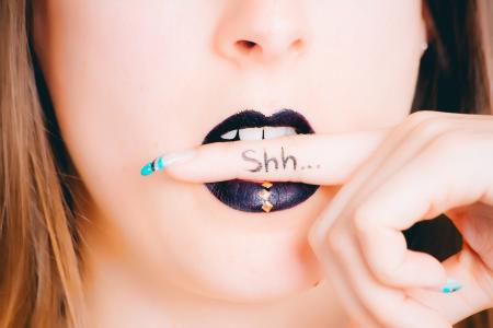 Woman Wearing Purple Lipstick