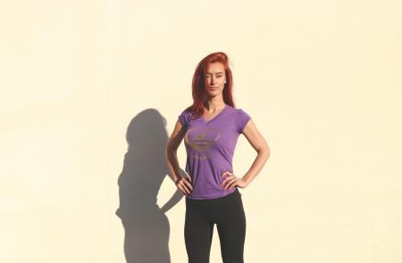 Woman Wearing Purple Shirt and Black Pants