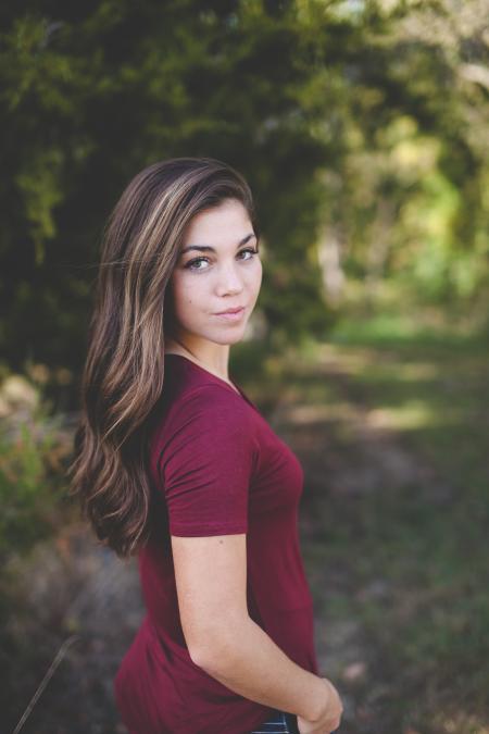 Woman Wearing Red Dress on the Woods during Daytime