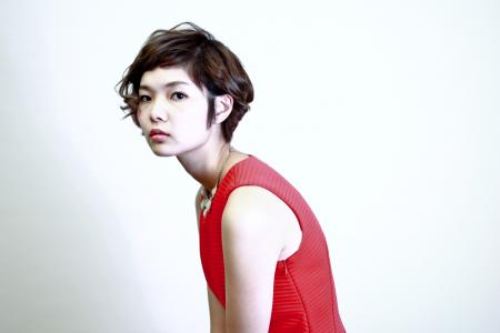 Woman Wearing Red Sleeveless Top