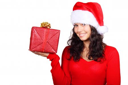 Woman Wearing Santa Dress Holding Red and Gold Gift