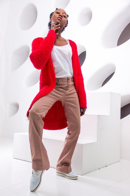 Woman Wearing Shirt, Red Cardigan, Beige Dress Pants