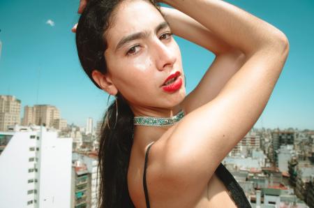 Woman Wearing Spaghetti-strap Top With Two Hands on Head