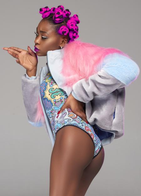 Woman Wearing White and Pink Fur Coat and Blue One-piece Swimsuit