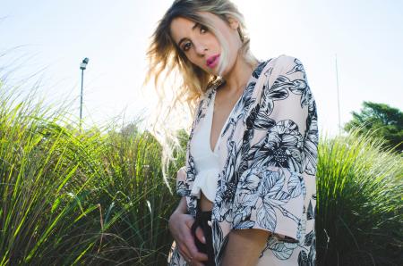 Woman Wearing White, Black, and Gray Floral Print Cardigan