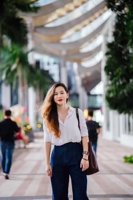 Woman Wearing White Dress Shirt and Blue Pants