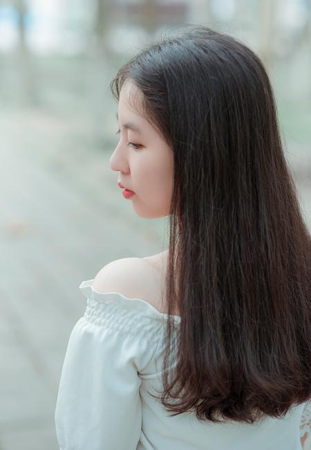 Woman Wearing White Off-shoulder Top