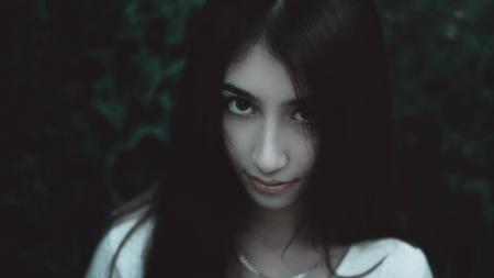 Woman Wearing White Shirt and Silver Chain Necklace