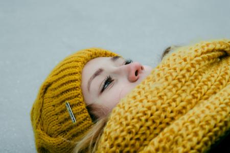 Woman Wearing Yellow Crochet Cap and Scarf