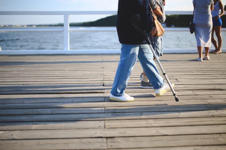 Woman with a crutch