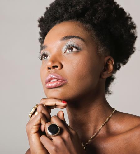 Woman With Gold-colored Accessories Taking Picture Inside Room