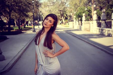 Woman With Gray Sleeveless Dress