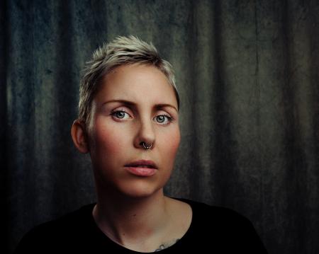 Woman With Silver-colored Septum Piercing