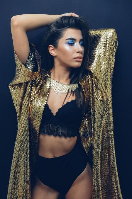 Women's Wearing Gold Sequin Cardigan