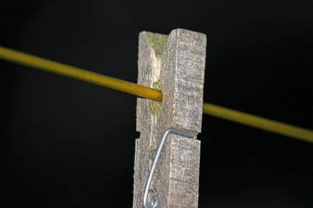 Wooden peg on a washing line
