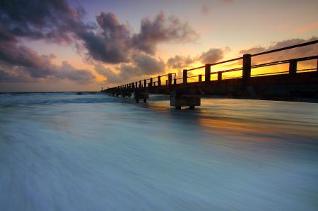 Wooden Pier on Ocean Waves