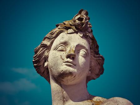 Worm's Eye View of White Concrete Statue Under Clear Blue Sky during Daytime