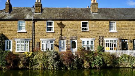 Yellow and White Bricked House