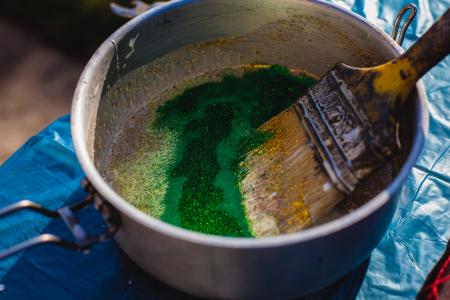 Yellow Paint Brush on Gray Steel Bucket