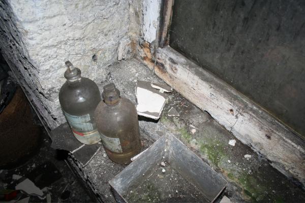 2 bottles by the window