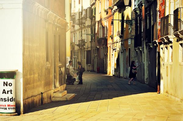 3 Person Standing in Alley